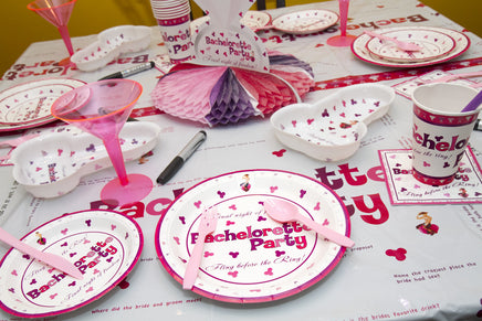 Pink and Purple Penis Party Dessert Plates on the Table